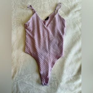 Purple lace body suit. Size large.